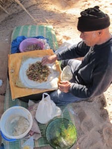 Berber cooking traditional Berber pizza Saf Saf Oasis Morocco_Source NOSADE