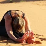 desert-yoga-forward-bend_source-nosade