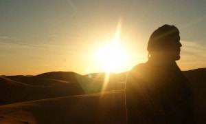 Desert sunset riding a dromedary_Source NOSADE