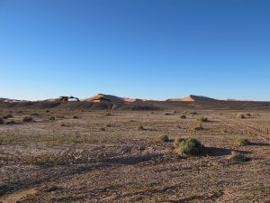 Nomad tents in front of dunes of Erg Chebbi Merzouga Sahara Desert Morocco_Source NOSADE