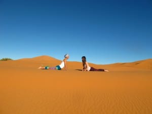 Sahara desert yoga retreat Morocco Erg Chebbi Bhujangasana Cobra Pose_Source NOSADE